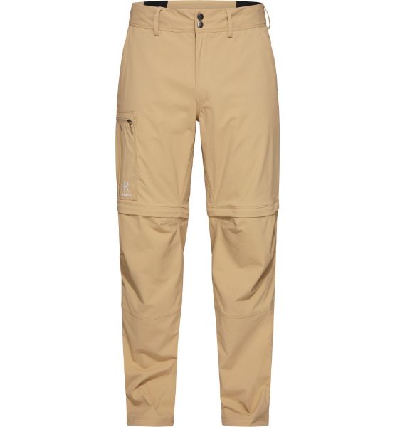 Haglöfs Mid Standard Zip-Off Pant. Disse alsidige bukser kombinerer funktionalitet og komfort med deres slidstærke Climatic™ materiale. Udstyret med to åbne håndlommer og en praktisk lynlåslomme på låret.